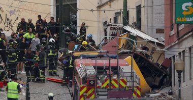 Police and firefighters work on the site of a funicular railway accident in Lisbon, Sept. 3, 2025. (AFP Photo)