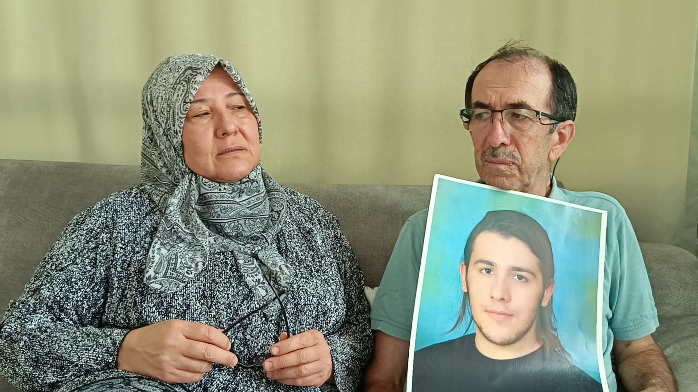 Zuhal Dölek (L) and Hasan Dölek, parents of Furkan Dölek, wait for news of their son in Kozan, Adana, Türkiye, Sept. 2, 2025. (AA Photo)