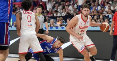 Türkiye&#039;s Alperen Şengün (R) in action with Serbia&#039;s Aleksa Avramovic (C) during the FIBA EuroBasket 2025 group phase at the Xiaomi Arena, Riga, Latvia, Sept. 3, 2025. (Reuters Photo)