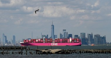 An Ocean Network Express (ONE) container ship sails Manhattan&#039;s skyline as it leaves New York Harbor, New York City, U.S.,  May 3, 2025. (AFP Photo)