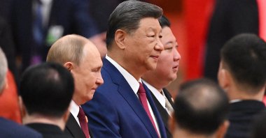 China’s President Xi Jinping (C), North Korea’s leader Kim Jong Un (C R) and Russia’s President Vladimir Putin (C L) arrive for a reception in the Great Hall of the People, in Beijing, China, Sept.  3, 2025. (AFP Photo)