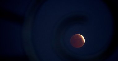 A rare &#039;Blood Moon&#039; total lunar eclipse is captured near totality from the village of Donon, 40 kilometers from Pontevedra, northwestern Spain, March 14, 2025. (AFP Photo)