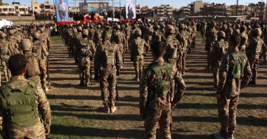YPG terrorists attend the funeral of a senior PKK terrorist killed in 2021, in Qamishli, northeastern Syria, Aug. 12, 2025. (EPA Photo)