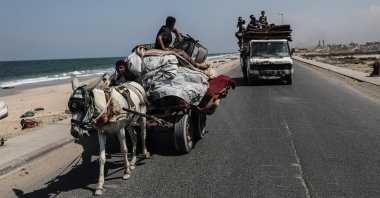 War-displaced Palestinians move along a coastal highway toward northern Gaza from central Gaza City, Gaza Strip, Palestine, Sept. 4, 2025. (AA Photo)