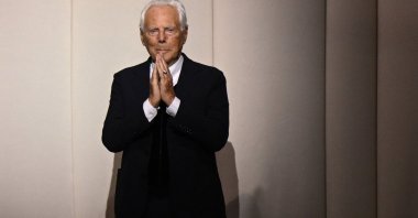Italian fashion designer Giorgio Armani acknowledges the audience at the end of the Giorgio Armani Prive show as part of the Women&#039;s Haute-Couture Fall/Winter 2023/2024 Fashion Week in Paris, France, July 4, 2023. (AFP Photo)