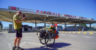 British traveler walks to complete the Türkiye leg of his 26-year journey before leaving through the Kapıkule Border Gate, Edirne, Türkiye, Sept. 1, 2025. (AA Photo)