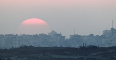 The sun sets over Gaza city, as seen from the Israeli side of the border, Sept. 4, 2025. (Reuters Photo)