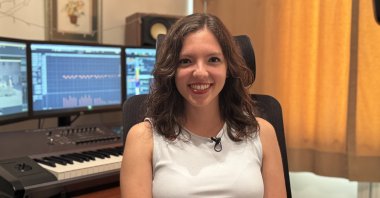 Turkish musician Esin Aydıngöz poses for the camera, Istanbul, Türkiye, Aug. 20, 2025. (AA Photo)