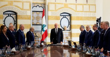 Lebanese President Joseph Aoun, Prime Minister Nawaf Salam and members of the cabinet stand as they attend a cabinet session to discuss the army&#039;s plan to disarm Hezbollah, at the Presidential Palace in Baabda, Lebanon, Sept. 5, 2025. (Reuters Photo)