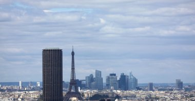 A general view shows the Montparnasse Tower and the Eiffel Tower with the financial and business district of La Defense in the background, Paris, France, Aug. 22, 2025. (Reuters Photo)