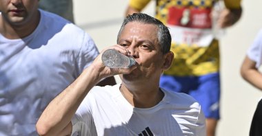 Republican People&#039;s Party (CHP) Chair Özgür Özel drinks water during a run to honor his party&#039;s anniversary, Ankara, Türkiye, Sept. 7, 2025. (AA Photo)