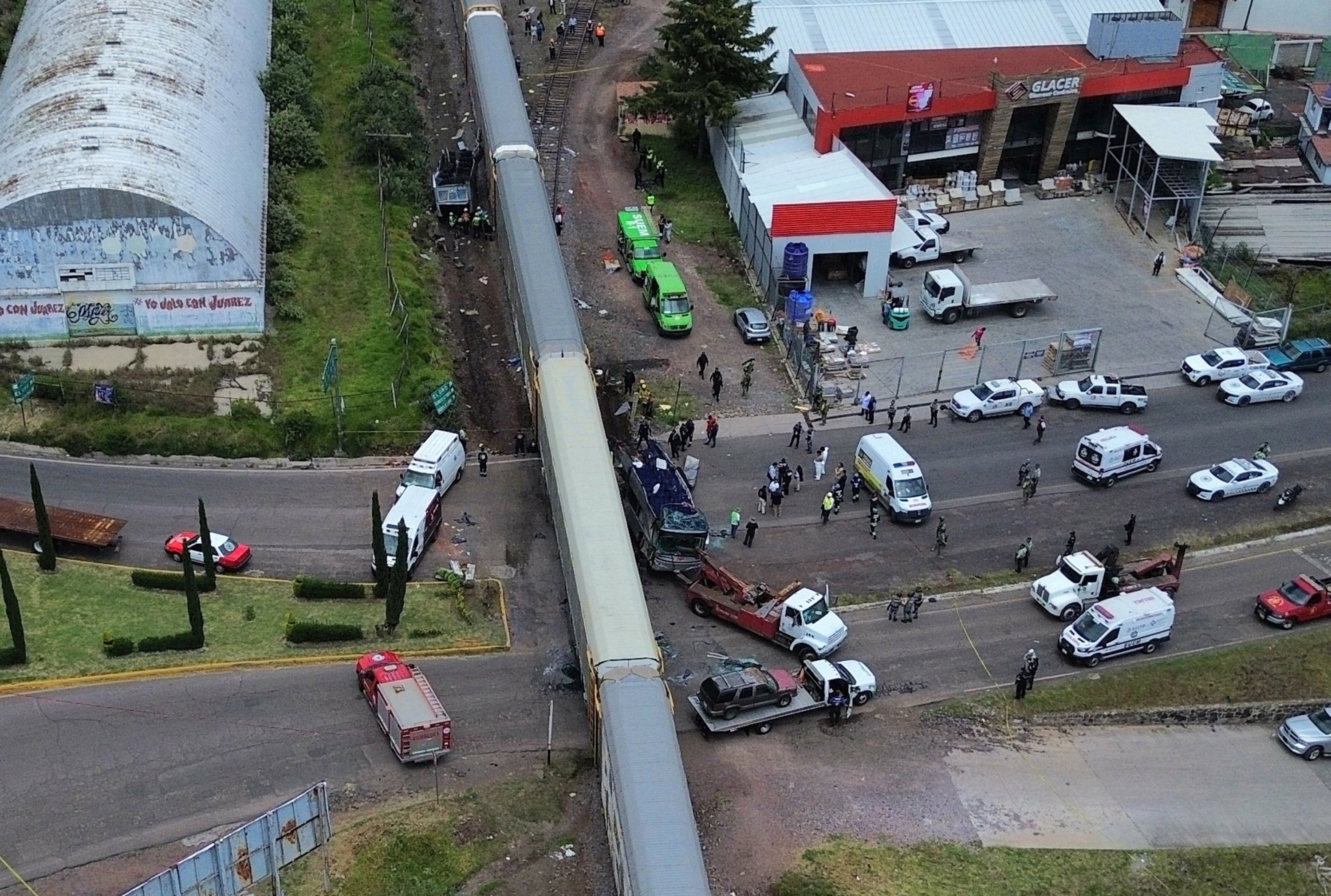 At least 8 killed after freight train hits bus near Mexico City
