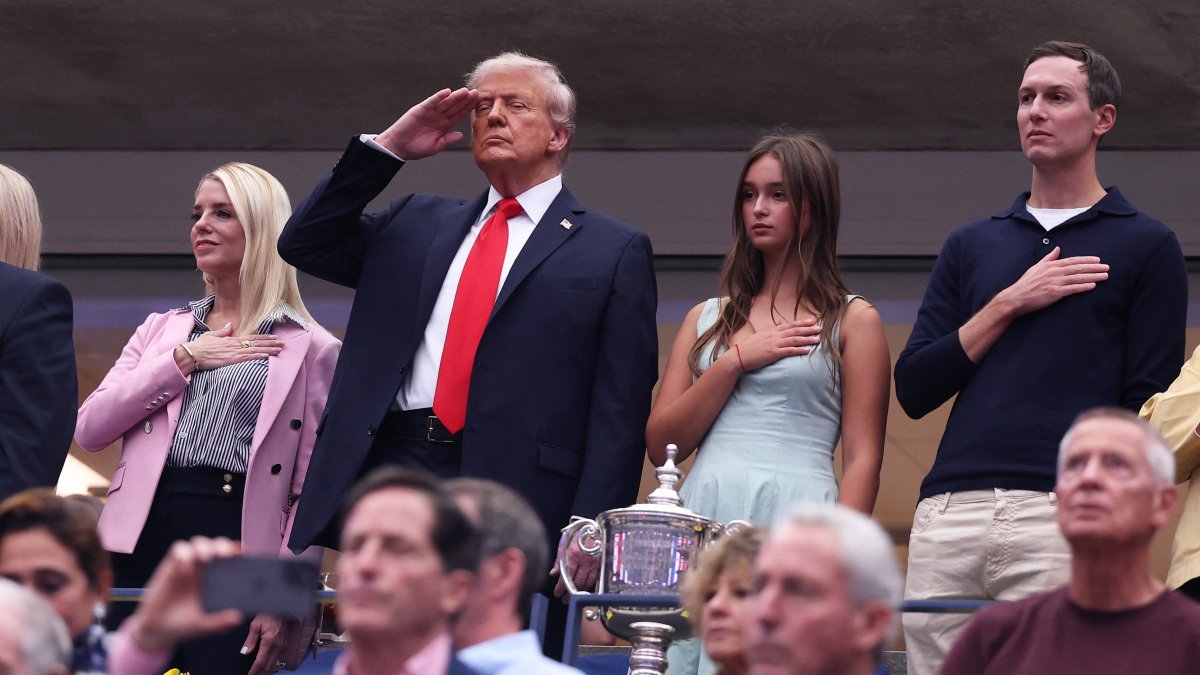 Trump draws cheers, boos at US Open as delays test fans’ patience