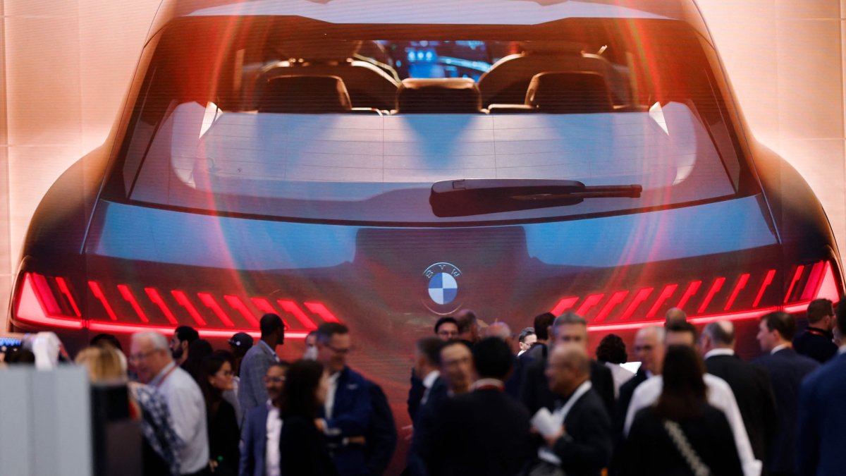 A BMW car is seen on a display at the booth of German carmaker BMW during the International Motor Show IAA in Munich, southern Germany, Sept. 8, 2025. (AFP Photo) 