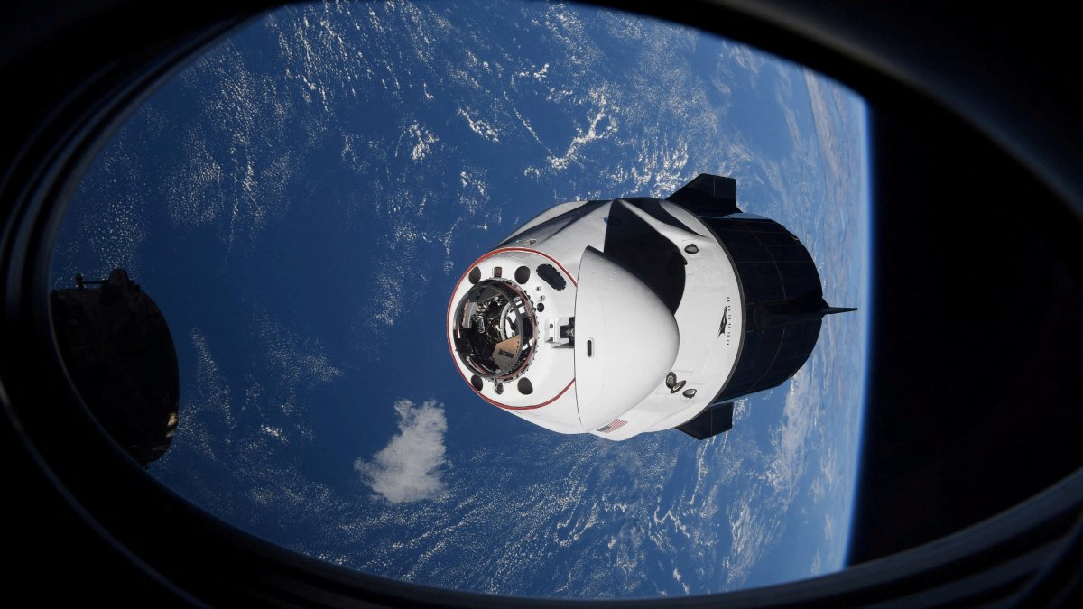 The SpaceX Crew Dragon capsule Endeavor, carrying four astronauts, approaches the International Space Station orbiting the Earth April 24, 2021. (Reuters File Photo)