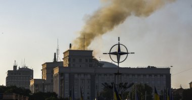 Smoke rises over the buildings housing Ukraine&#039;s Cabinet, central Kyiv, Ukraine, Sept. 7, 2025. (EPA Photo)