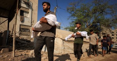 Mourners carry the bodies of Palestinian sisters Layan Salem, 2, and Eman Salem, 5, who were killed in an overnight Israeli strike on a tent in Gaza City, Palestine, Sept. 8, 2025. (Reuters Photo)
