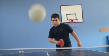 Turkish table tennis player with Down syndrome Göktuğ Onur trains at the Ayas Bizim Çocuklar Sports Movement Center, Adana, Türkiye, Sept. 8, 2025. (AA Photo)