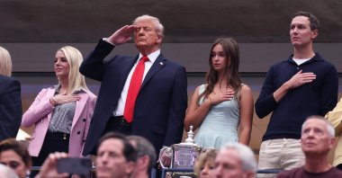 U.S. President Donald Trump (2nd L) during the national anthem before the Men&#039;s Singles Final match between Jannik Sinner of Italy and Carlos Alcaraz of Spain on Day Fifteen of the 2025 US Open at USTA Billie Jean King National Tennis Center, New York City, U.S., Sept. 7, 2025. (AFP Photo)