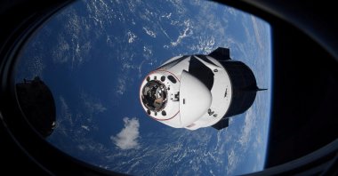 The SpaceX Crew Dragon capsule Endeavor, carrying four astronauts, approaches the International Space Station orbiting the Earth April 24, 2021. (Reuters File Photo)