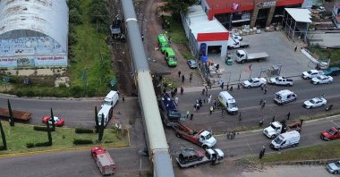 An aerial picture shows the accident site of a collision between a train and a bus in Atlacomulco, Mexico, Sept. 8, 2025. (EPA Photo)