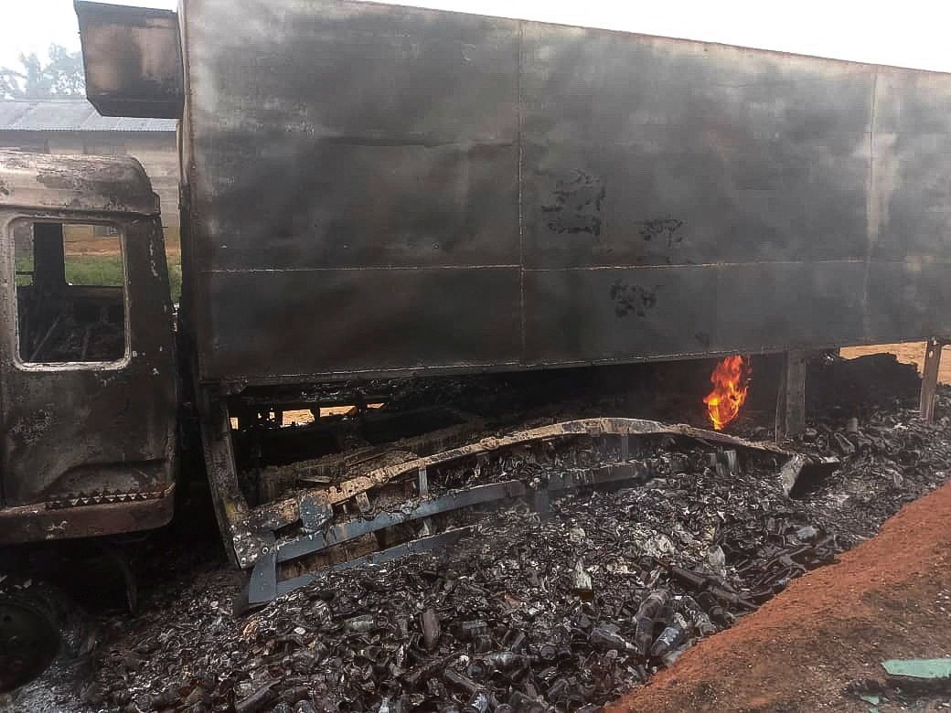A charred wreckage of a truck stands on a road after it was burnt following an attack by Daesh-affiliated Allied Democratic Forces (ADF) rebels, in the town of Ntoyo in North Kivu province&#039;s Lubero territory, eastern Democratic Republic of Congo Sept. 9, 2025. (Reuters Photo)