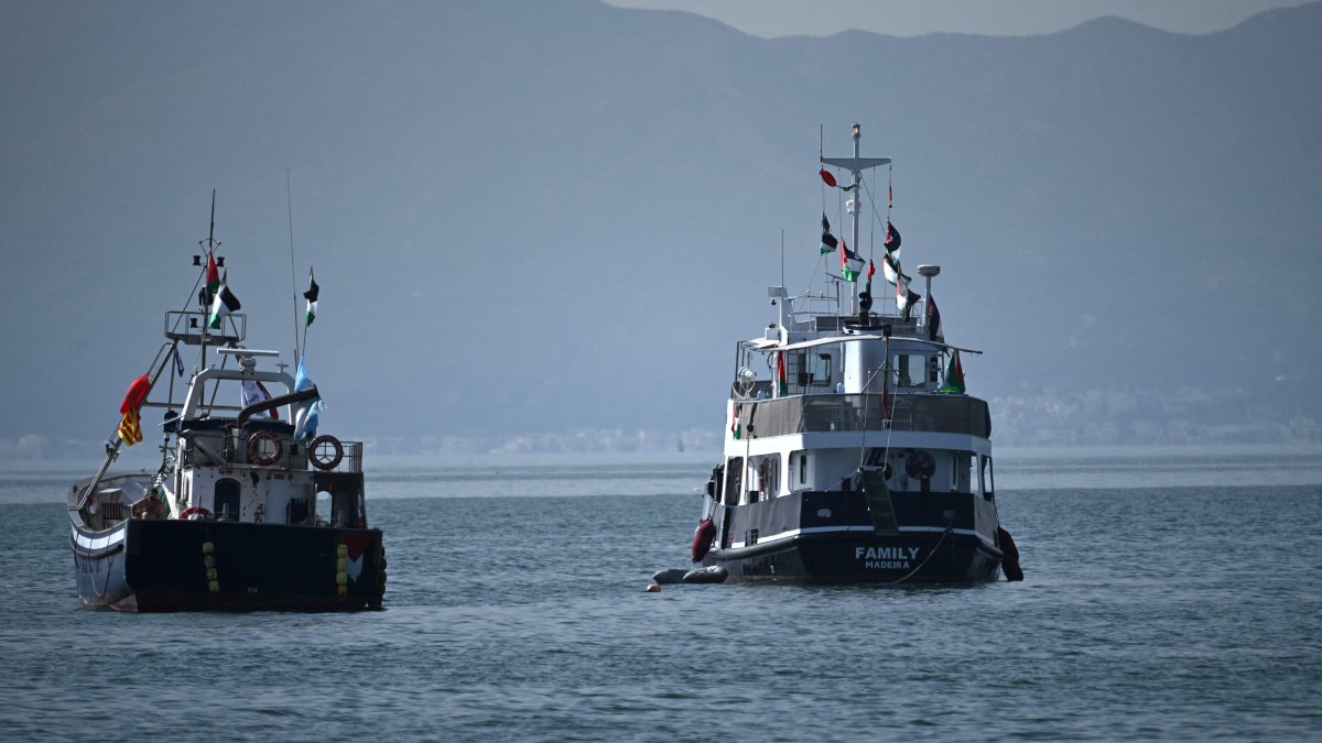 A ship (R), known as the "Family" and is part of the Global Sumud Flotilla, is anchored off the coast of the village of Sidi Bou Said, Tunisia, Sept. 9, 2025. (AFP Photo)