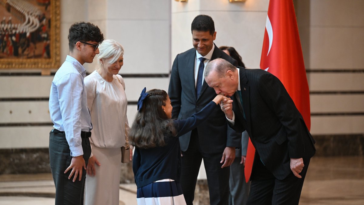 Luxembourg’s new Ambassador Daniel Da Cruz introduces embassy staff and family members to President Recep Tayyip Erdoğan during a ceremony at the Presidential Complex in Ankara, Türkiye, Sept. 9, 2025. (AA Photo)