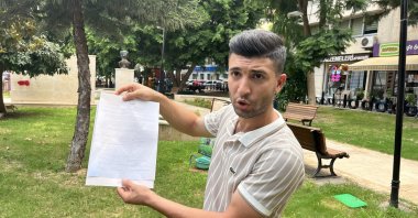 Sadık Şaşmaz talks about his recent job loss during an interview in Adana, southern Türkiye, Sept. 9, 2025. (IHA Photo)