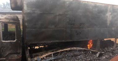 A charred wreckage of a truck stands on a road after it was burnt following an attack by Daesh-affiliated Allied Democratic Forces (ADF) rebels, in the town of Ntoyo in North Kivu province&#039;s Lubero territory, eastern Democratic Republic of Congo Sept. 9, 2025. (Reuters Photo)