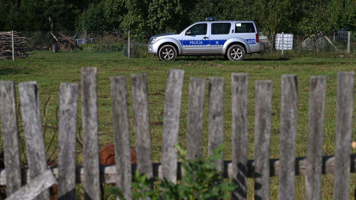Police at the site after a Russian drone damaged the roof of a residential building in Wyryki, eastern Poland, Sept. 10, 2025. (EPA Photo)