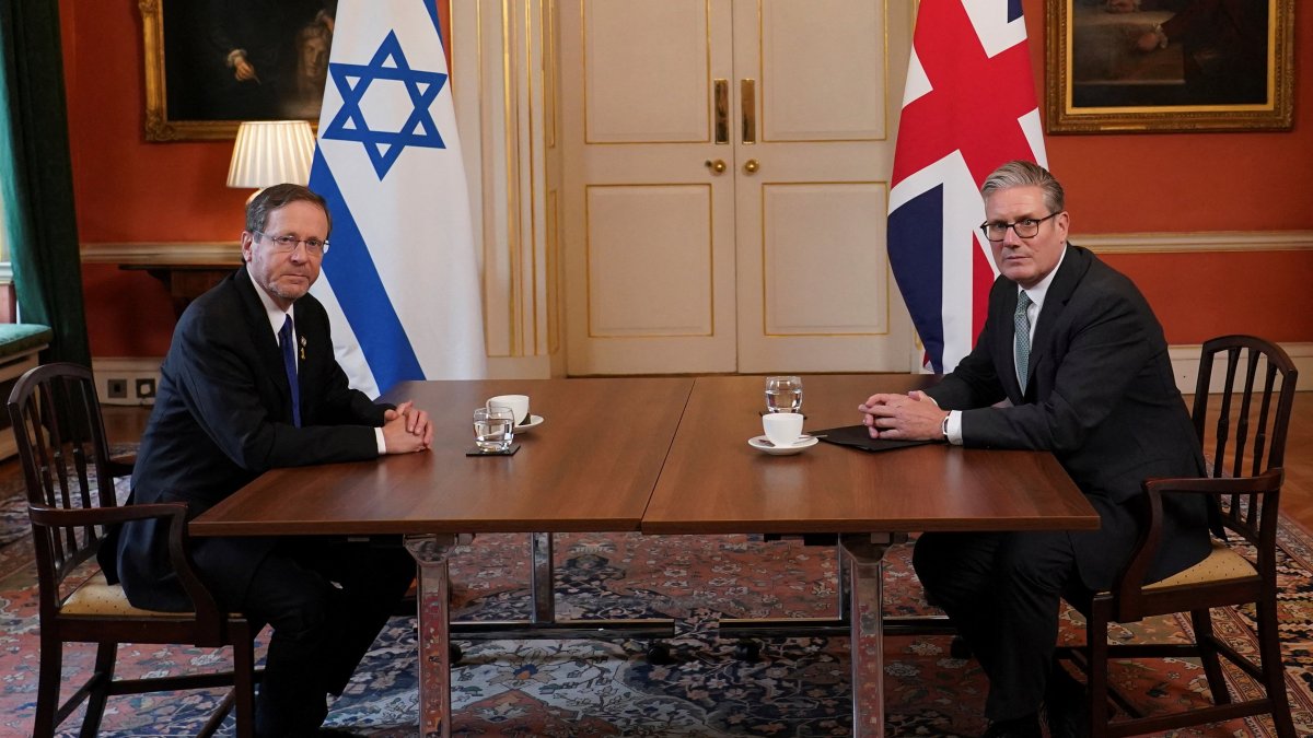 Britain&#039;s Prime Minister Keir Starmer sits with Israel&#039;s President Isaac Herzog as he visits 10 Downing Street in London, Sept. 10, 2025. (Reuters Photo)