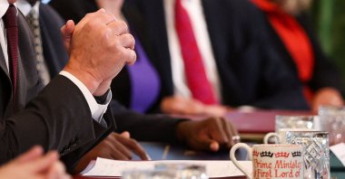 The mug of Britain&#039;s Prime Minister Keir Starmer (L) is pictured as he chairs a Cabinet meeting inside 10 Downing Street, London, U.K., Sept. 9, 2025. (AFP Photo)