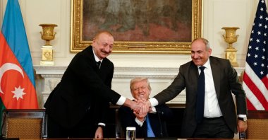 Azerbaijan&#039;s President Ilham Aliyev (L), U.S. President Donald Trump (C) and Armenia&#039;s Prime Minister Nikol Pashinyan join hands during a signing ceremony in the White House, Washington, U.S., Aug. 8, 2025. (EPA Photo)