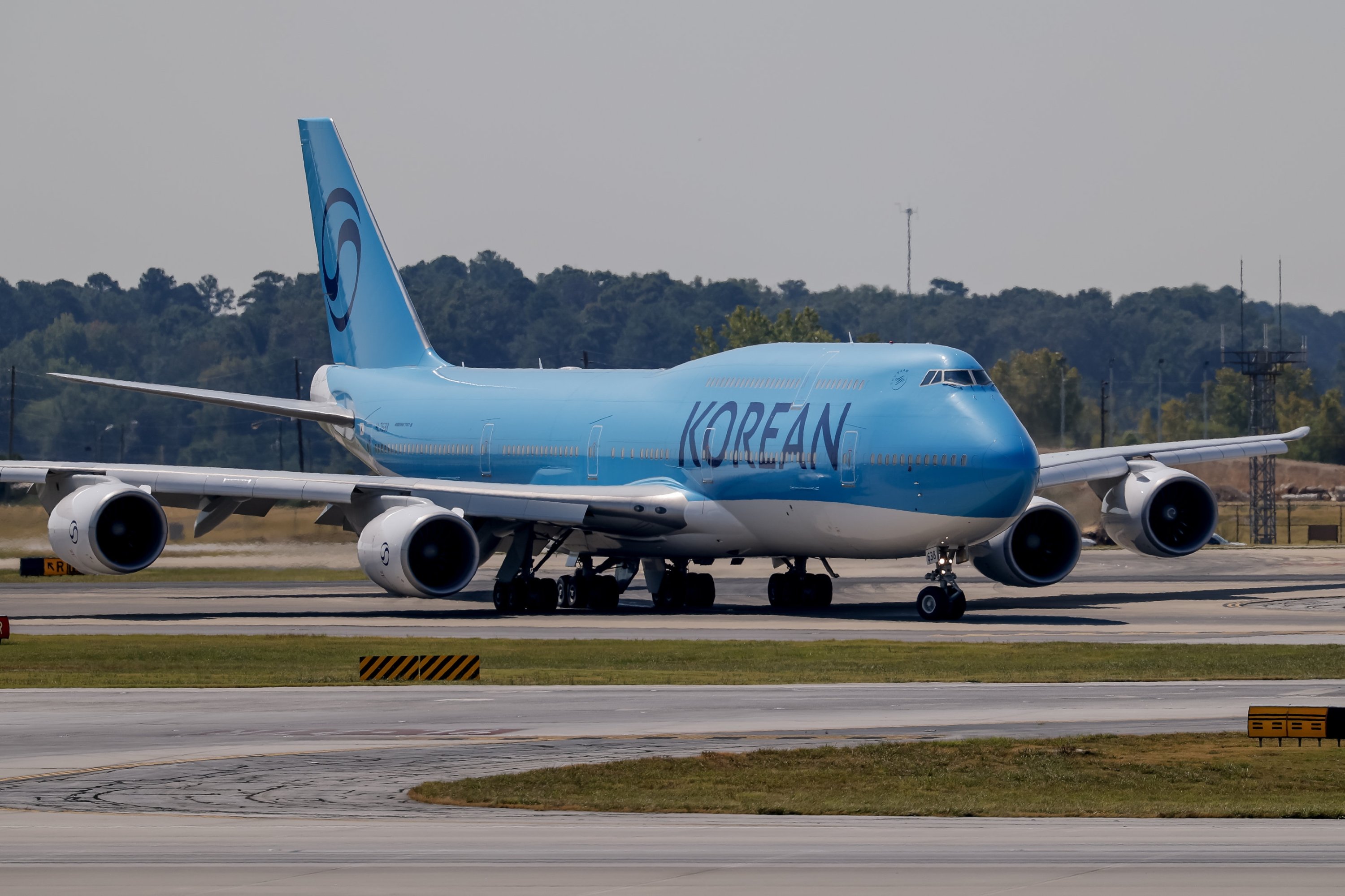 South Korean workers detained in Hyundai raid fly out of US