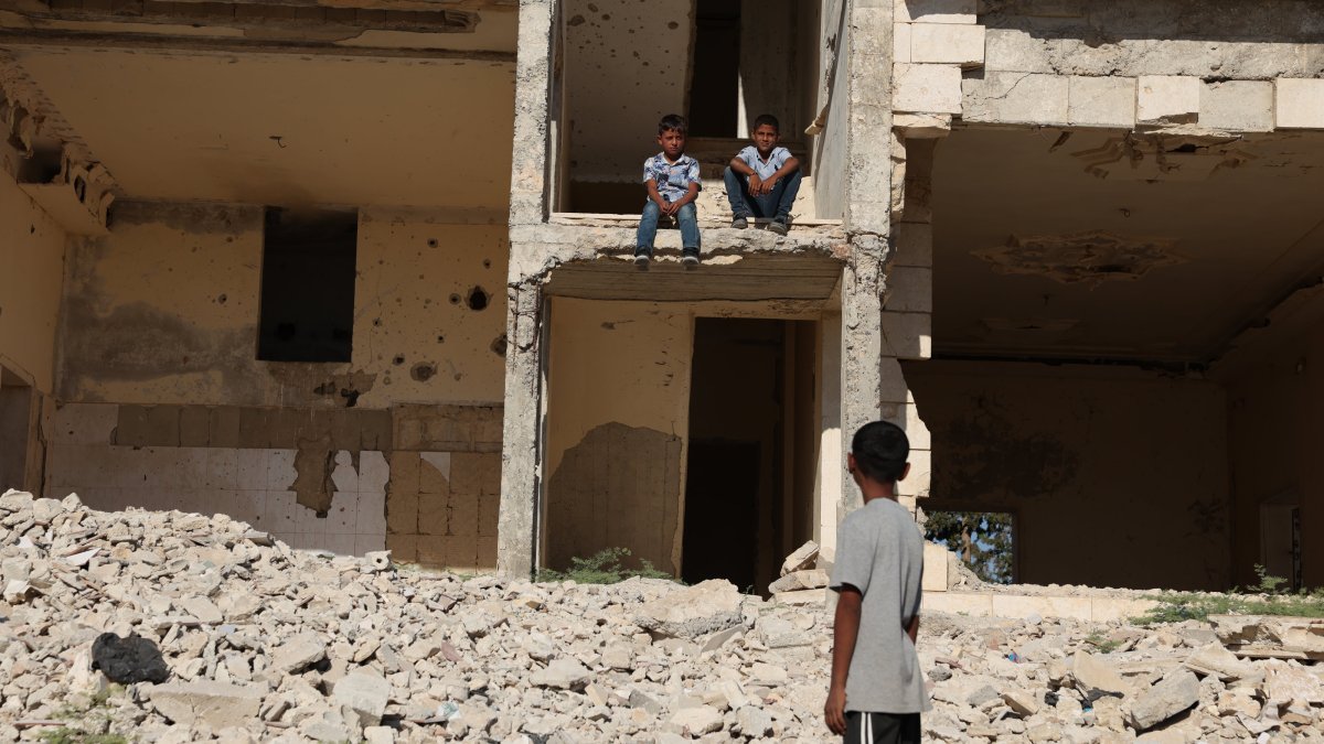 Children are seen in the Manbij district of Aleppo province in Syria, Sept.11, 2025 (AA Photo)
