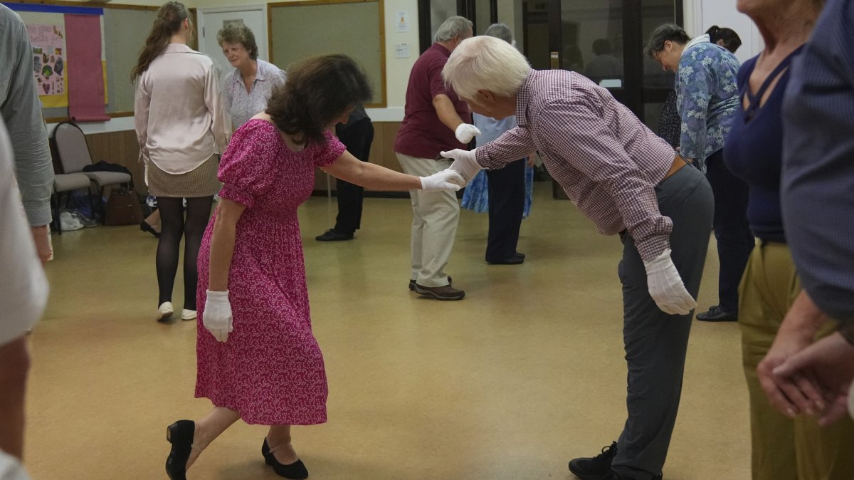 Members of the Hampshire Regency Dancers practice dance ahead of the 10-day Jane Austen Festival, Winchester, U.K., Sept. 10, 2025. (AP Photo)