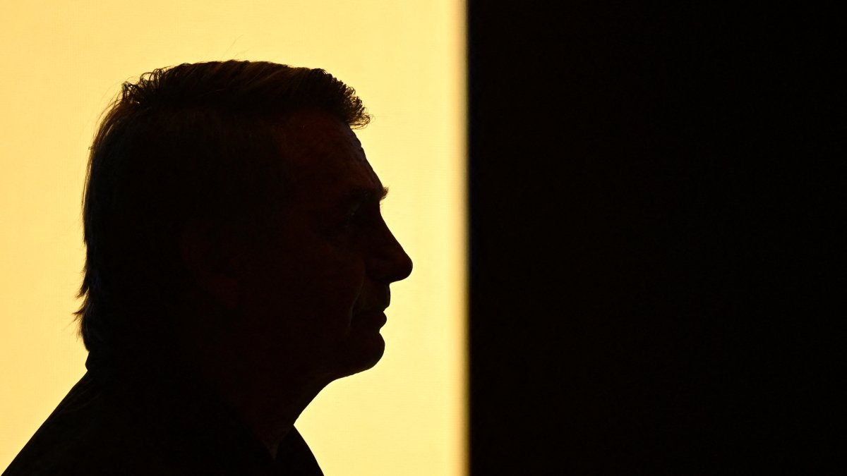 Silhouette of former Brazilian President Jair Bolsonaro taken during the first edition of the Liberal Party&#039;s Communication Seminar, Brasilia, Brazil, Feb. 20, 2025. (AFP Photo)