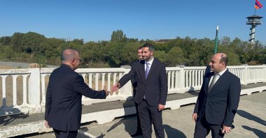 Ambassador Serdar Kılıç is seen (L) with Armenia&#039;s Special Envoy Ruben Rubinyan at the border, Iğdır, Türkiye, Sept.11, 2025 (DHA Photo)