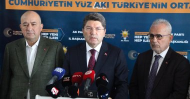 Justice Minister Yılmaz Tunç (C) speaks at a press conference at the Justice and Development Party (AK Party) Provincial Headquarters, Çanakkale, Türkiye, Sept. 12, 2025. (AA Photo)
