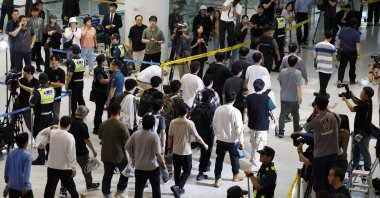 South Korean workers detained in a U.S. Immigration and Customs Enforcement raid at a Georgia factory arrive at Incheon International Airport in Incheon, South Korea, Sept. 12, 2025. (EPA Photo)