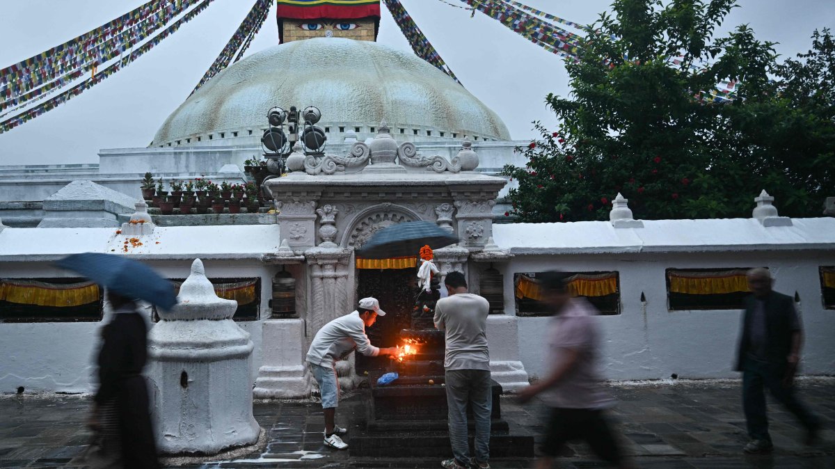 Buddhist devotees visit the Boudhanath Stupa in Kathmandu, Nepal, Sept. 13, 2025. (AFP Photo)