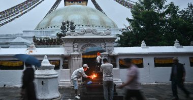 Buddhist devotees visit the Boudhanath Stupa in Kathmandu, Nepal, Sept. 13, 2025. (AFP Photo)