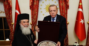 President Recep Tayyip Erdoğan and Patriarch Theophilos Giannopoulos (L) exchanged gifts during their meeting in Istanbul, Türkiye, Sept. 13, 2025. (DHA Photo)