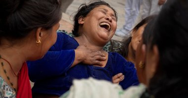 Bhagwati Balami, mother of Subhlal Balami, 28, who died in last week&#039;s anti-corruption protests, mourns during his cremation, in Kathmandu, Nepal, Sept. 14, 2025. (Reuters Photo)