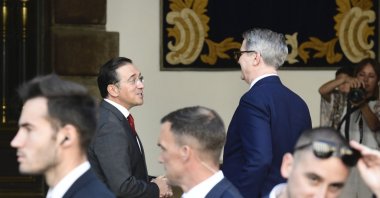 Spanish Foreign Affairs Minister Jose Manuel Albares (C-L) greets U.S. Secretary of the Treasury Scott Bessent (C-R) upon his arrival, Madrid, Spain, Sept. 14, 2025. (EPA Photo)