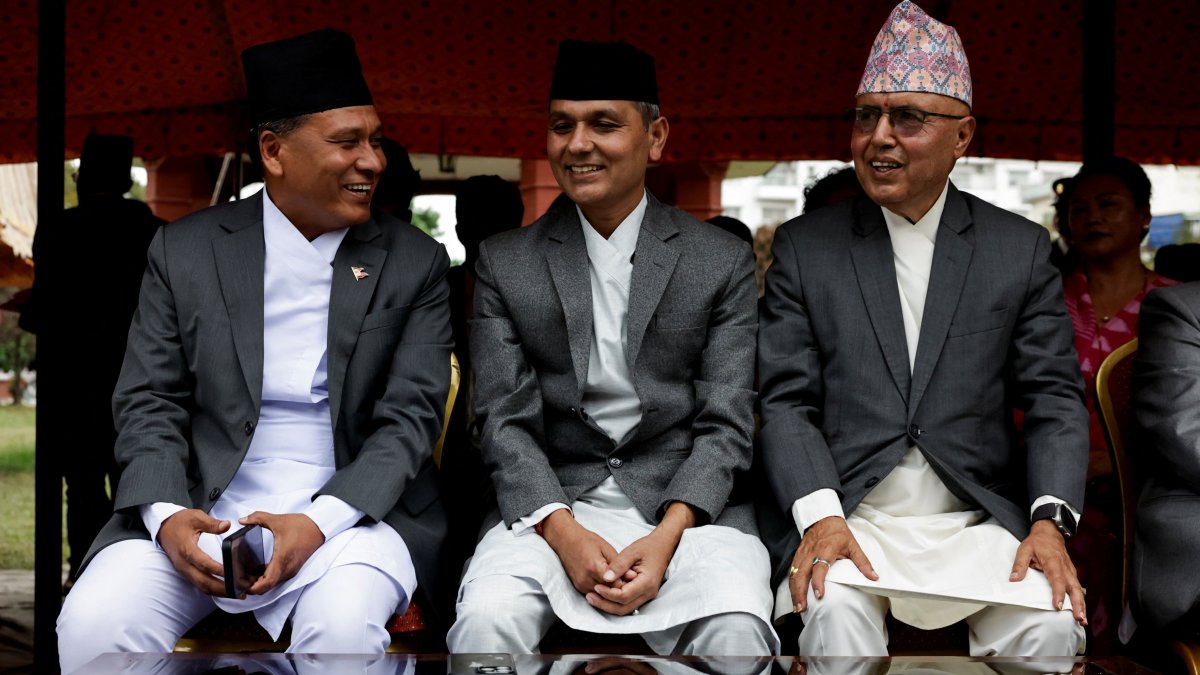 Newly appointed Finance Minister Rameshore Khanal, Energy Minister Kulman Ghising, and Home Minister Om Prakash Aryal smile as they speak with each other after taking the oath of office, in Kathmandu, Nepal, Sept. 15, 2025. (Reuters Photo)