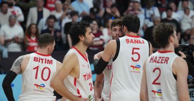 Türkiye&#039;s players react after losing the FIBA EuroBasket 2025 final between Türkiye and Germany at the Xiaomi Arena, Riga, Latvia, Sept. 14, 2025. (AFP Photo)