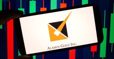 Alamos Gold company logo displayed on a mobile phone in Konskie, Poland, May 30, 2024. (Shutterstock Photo)