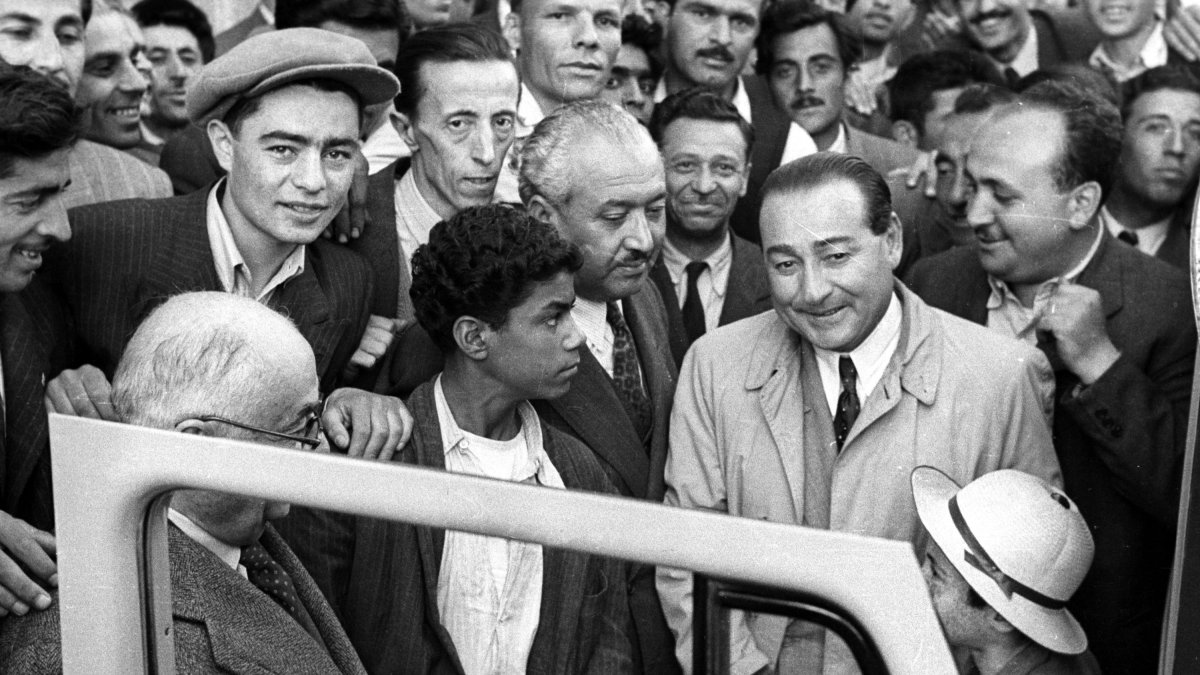 An archival photo of Prime Minister Adnan Menderes and his entourage setting out for the Ankara Provincial Administrative Board building after their election win was confirmed, Ankara, Türkiye, May 15, 1950. (Sabah Photo)